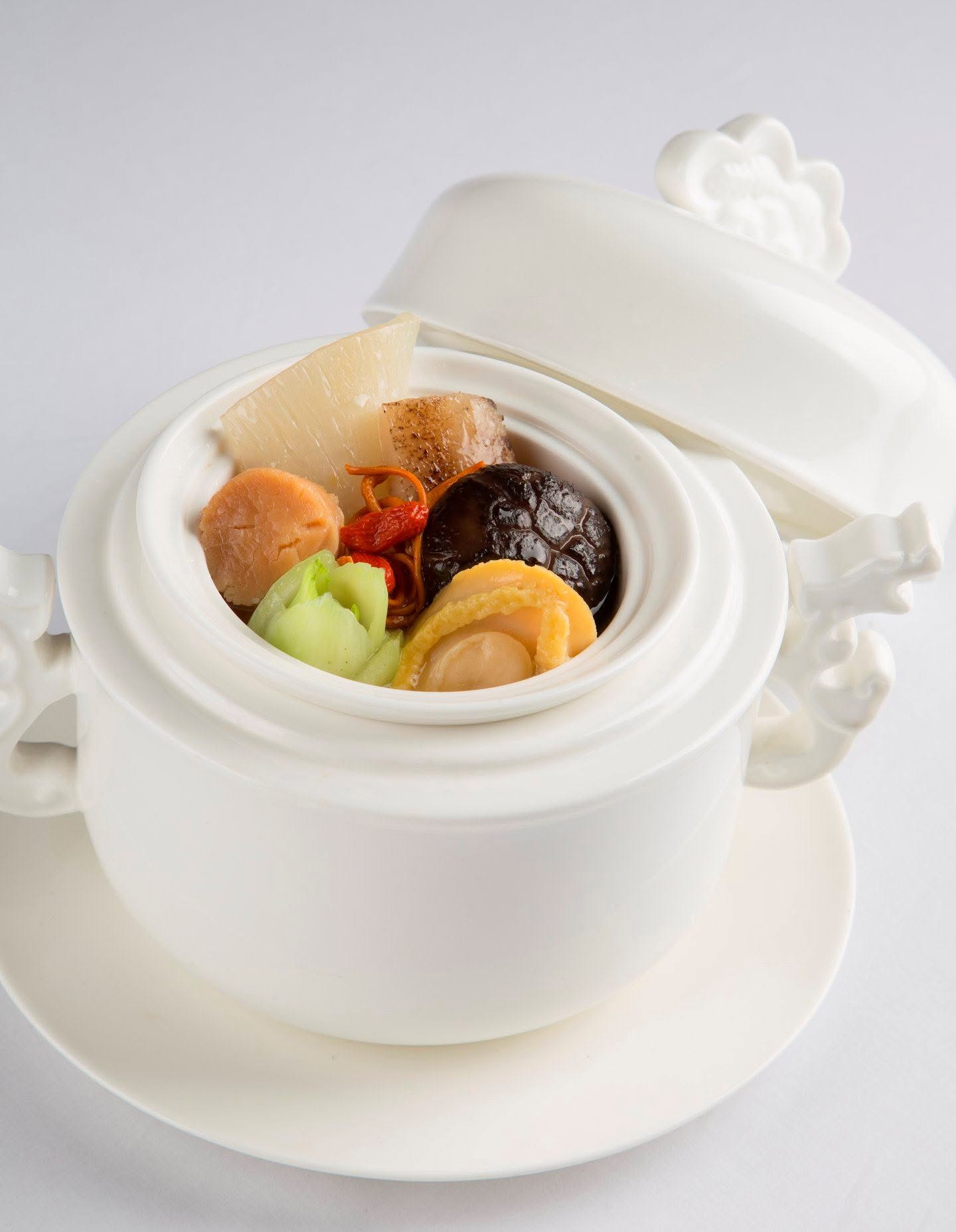 Buddha Jumps Over the Wall served in a white porcelain pot
