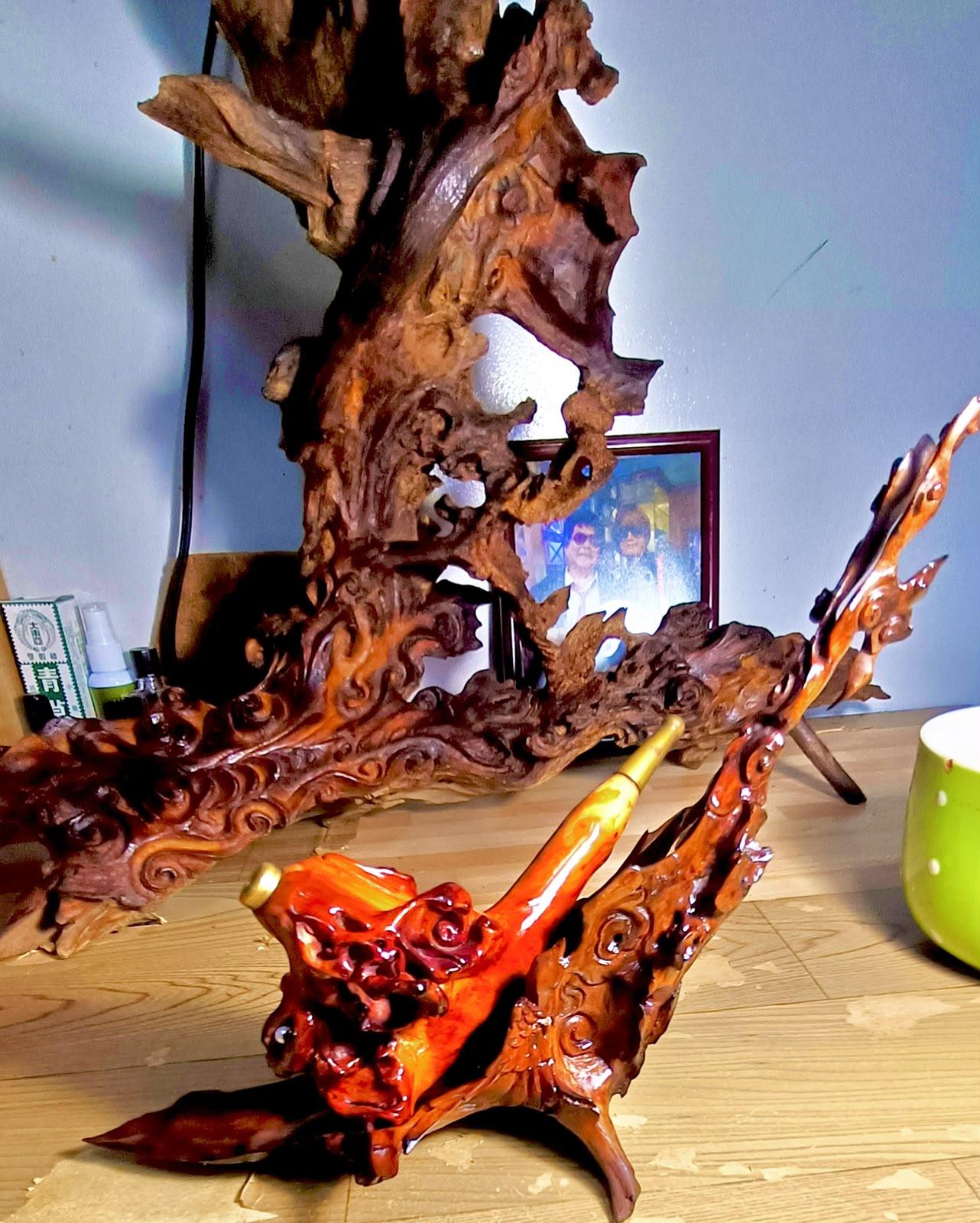 Chef Chan’s finished hand-carved wooden pipe stand