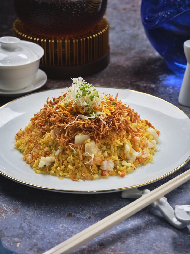 Crystal Dragon seafood fried rice topped with crispy dried scallop