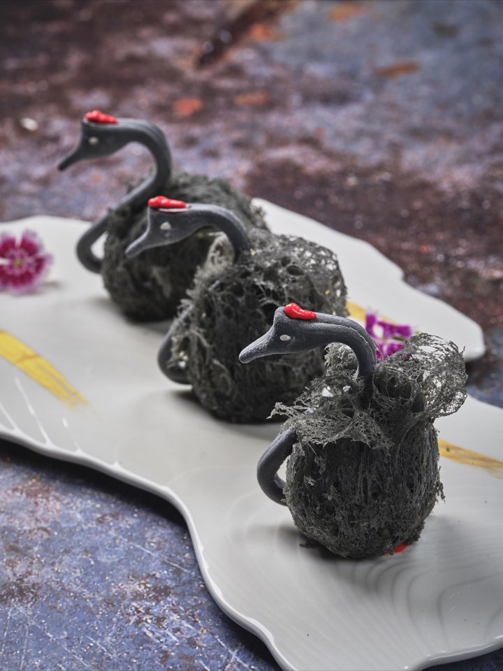 Deep-fried black swan-shaped taro puffs