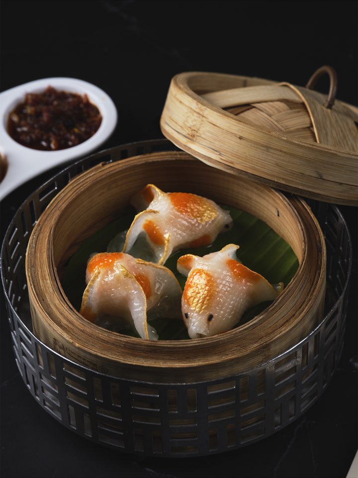 Goldfish-shaped dumplings filled with shrimp and diced pumpkin